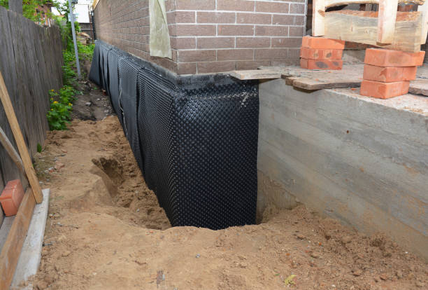 SJ Waterproofing Pros technician performing targeted Sump Pump Installation assessment in Culleoka, TN
